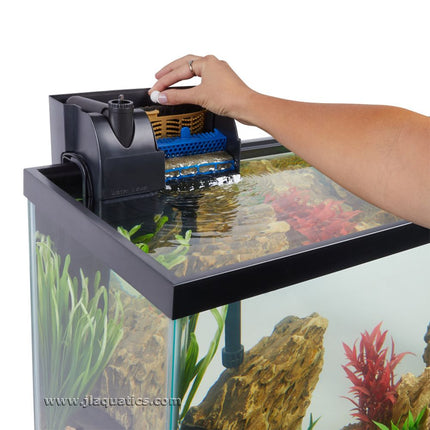 Aqueon AquaPacs Sludge Remover treating water in an aquarium filter