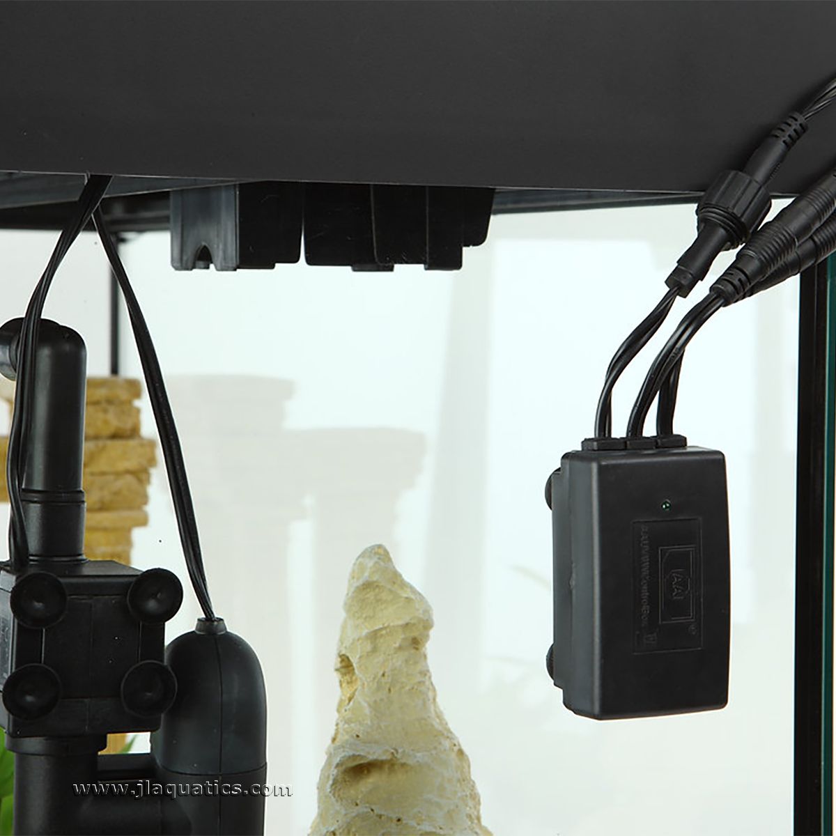 The power supply and ballast of the Green Killing Machine UV Sterilizer - 9 Watt mounts on the outside of the aquarium.