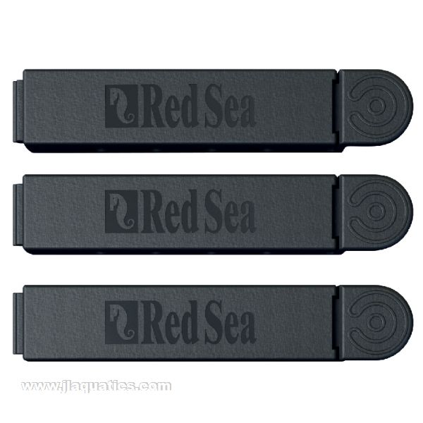 Red Sea ReefDose Tube Organizer Clip close up out of packaging.